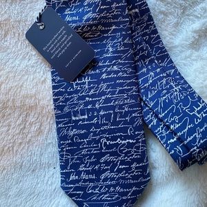 Men's 100% silk tie. Brand new with tag